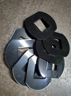 Cale de centrage pour bouche à clé